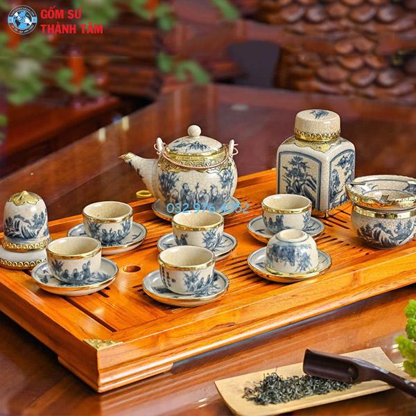 Ấm chén men rạn bọc đồng cam cổ trúc lâm thất hiền